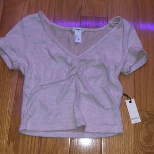 Cute crop top with a little cleavage from forever 21. never worn, great quality.